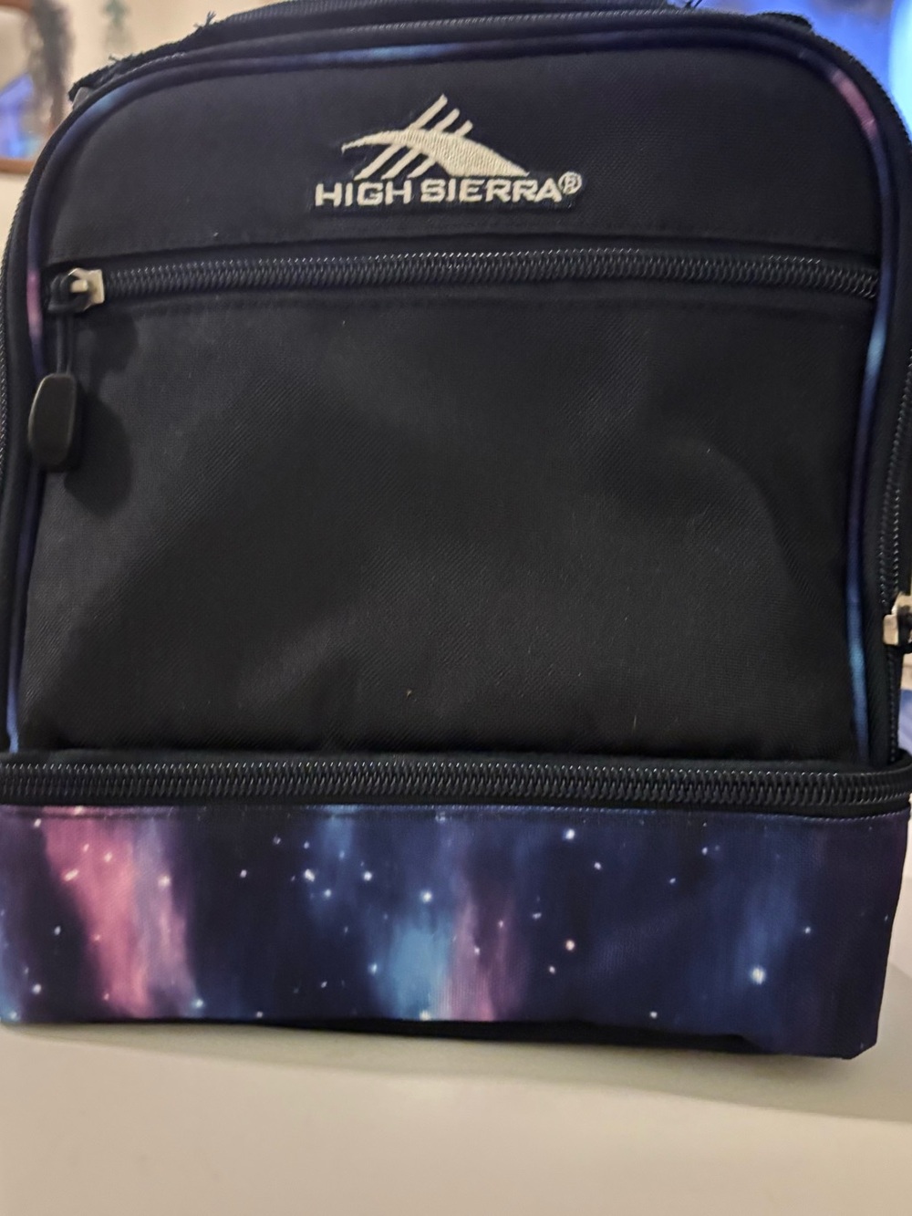 High Sierra stacked compartment lunch bag featuring a galaxy-themed design